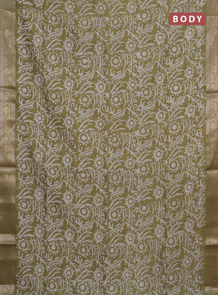 Maheshwari silk cotton saree elaichi green with batik prints and zari woven border