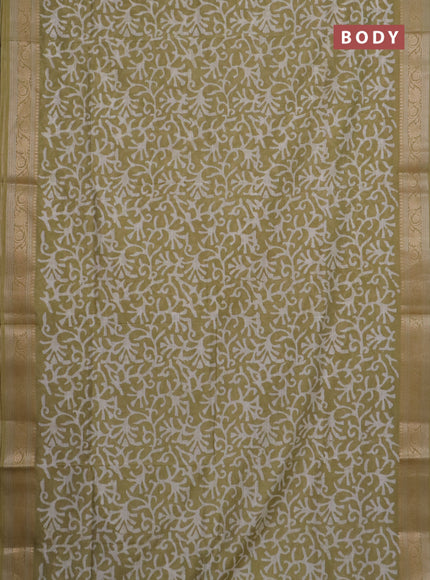 Maheshwari silk cotton saree elaichi green with batik prints and zari woven border