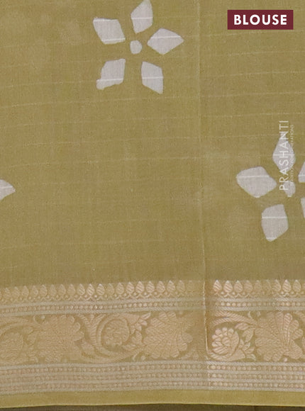 Maheshwari silk cotton saree elaichi green with batik prints and zari woven border
