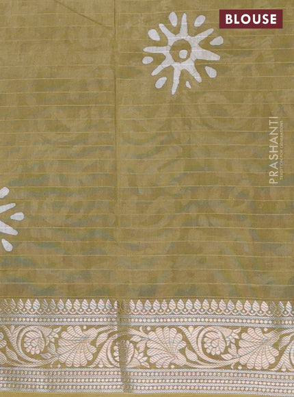 Maheshwari silk cotton saree elaichi green with batik prints and zari woven border
