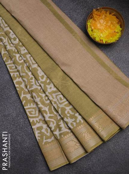 Maheshwari silk cotton saree elaichi green with batik prints and zari woven border