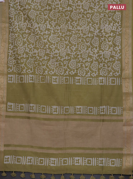 Maheshwari silk cotton saree elaichi green with batik prints and zari woven border
