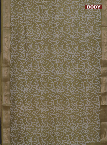 Maheshwari silk cotton saree elaichi green with batik prints and zari woven border