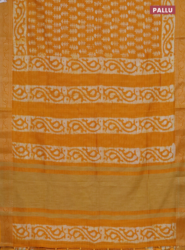 Maheshwari silk cotton saree mango yellow with batik prints and zari woven border