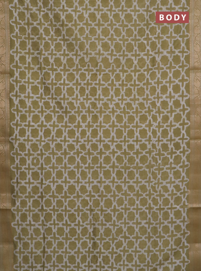 Maheshwari silk cotton saree elaichi green with batik prints and zari woven border