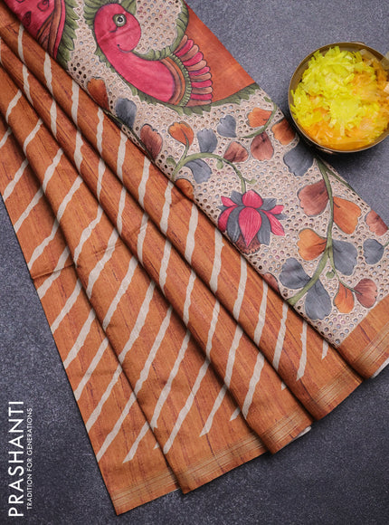 Semi tussar saree rust shade with leheriya prints and kalamkari prints & cut work pallu