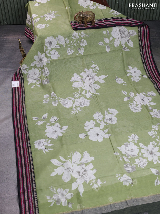 Kota silk cotton saree pastel green and black with allover floral digital prints and woven border