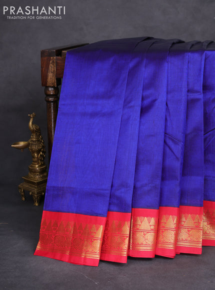 Silk cotton saree blue and red with plain body and zari woven korvai border