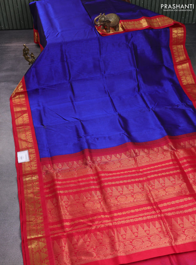Silk cotton saree blue and red with plain body and zari woven korvai border