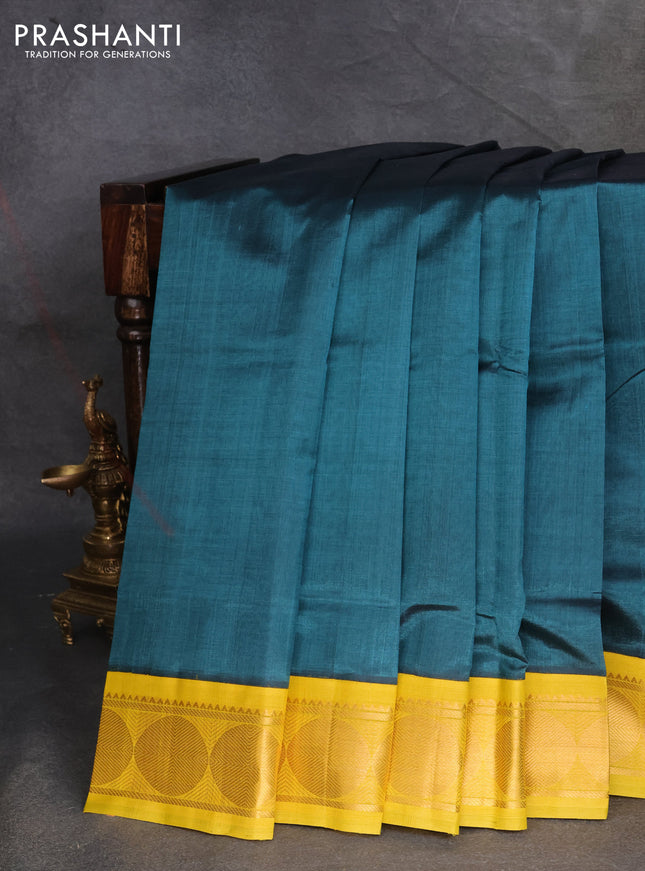Silk cotton saree peacock green shade and mustard yellow with plain body and rudhraksha zari woven korvai border