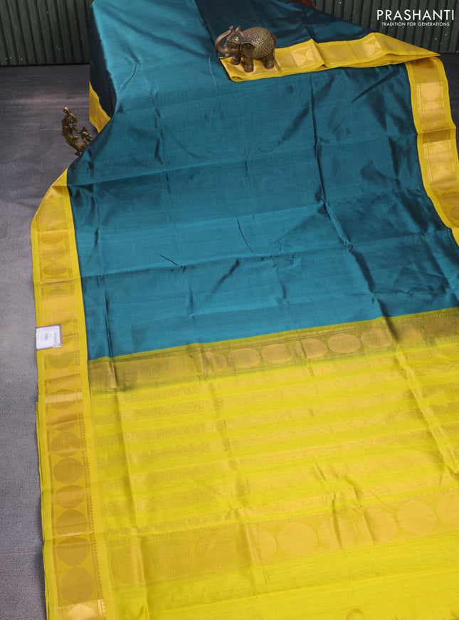 Silk cotton saree peacock green shade and mustard yellow with plain body and rudhraksha zari woven korvai border