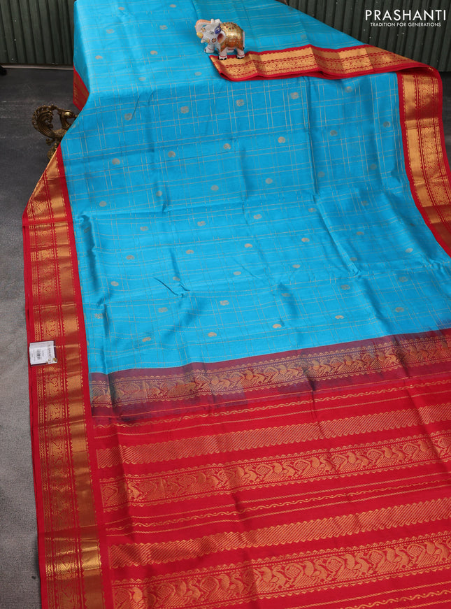 Silk cotton saree cs blue and red with allover zari checks & buttas and zari woven korvai border