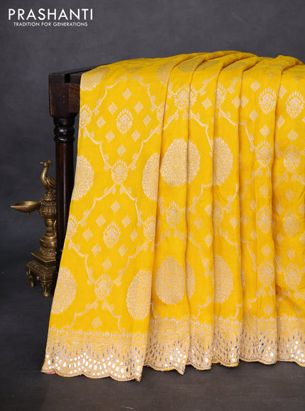 Banarasi silk saree yellow with allover zari woven jaal weaves and gotapatti work border
