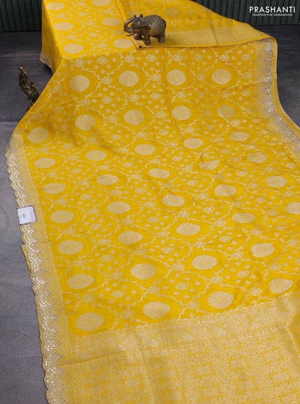 Banarasi silk saree yellow with allover zari woven jaal weaves and gotapatti work border