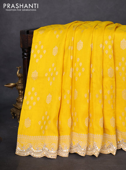 Banarasi silk saree yellow with allover zari woven butta weaves and gotapatti work border