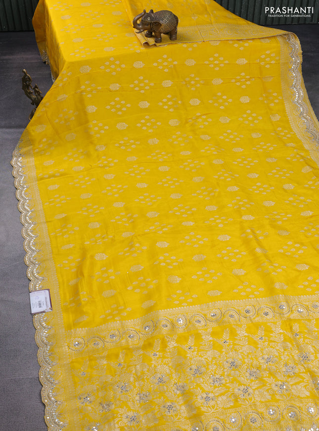 Banarasi silk saree yellow with allover zari woven butta weaves and gotapatti work border
