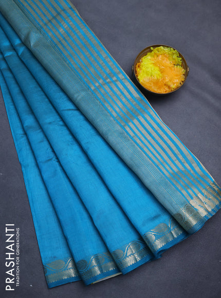 Semi raw silk saree teal blue with plain body and zari woven border