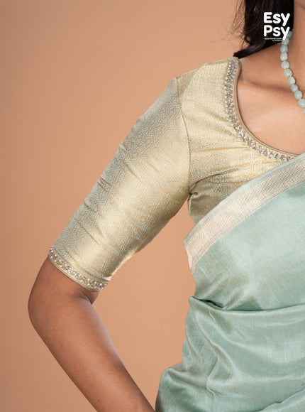 Pastel green Semi Tussar readymade saree with readymade brocade blouse