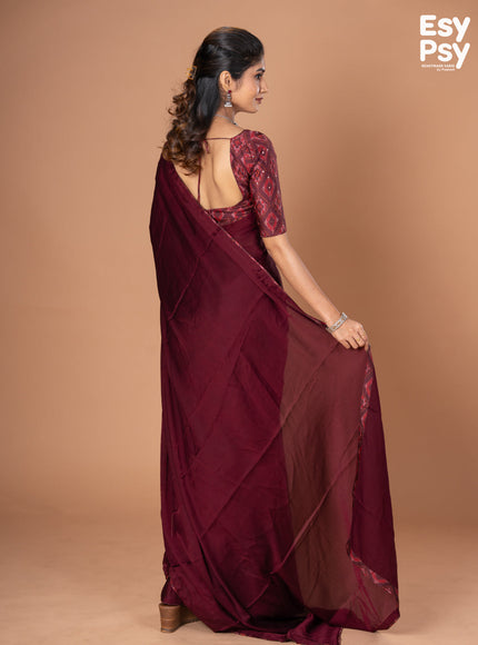 Maroon Satin Crepe readymade saree with readymade ikat printed blouse
