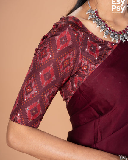 Maroon Satin Crepe readymade saree with readymade ikat printed blouse