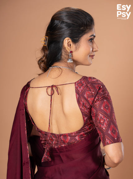 Maroon Satin Crepe readymade saree with readymade ikat printed blouse