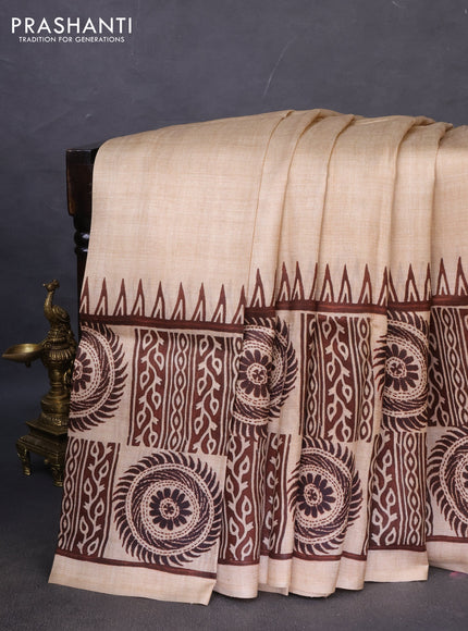 Printed silk saree sandal and brown with plain body and long printed border