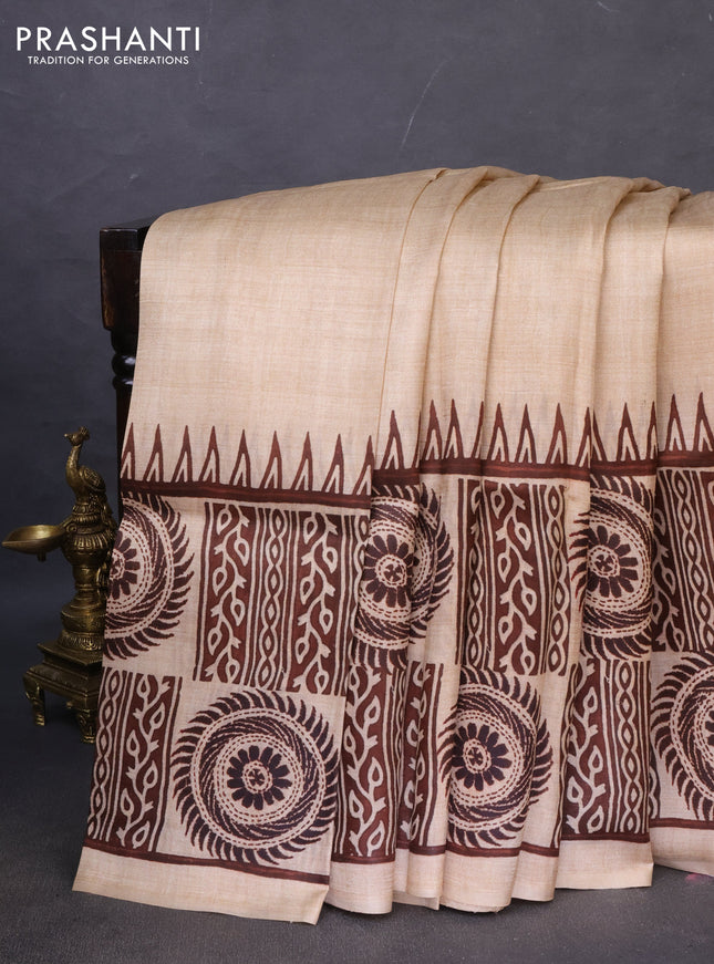 Printed silk saree sandal and brown with plain body and long printed border