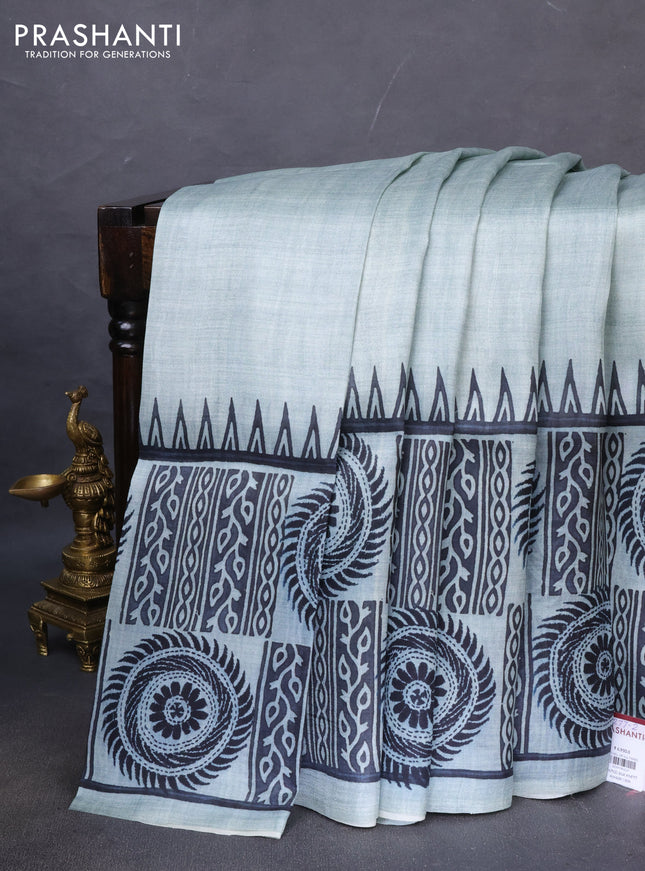 Printed silk saree pastel blue with plain body and long printed border