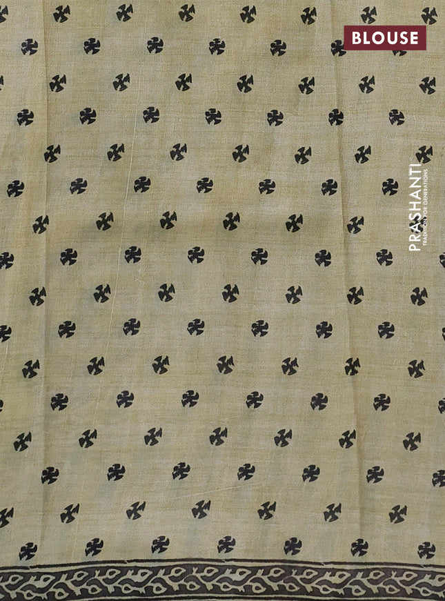 Printed silk saree beige and black with plain body and long printed border