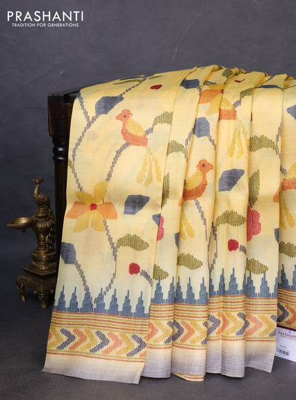 Printed silk saree pale yellow and grey with allover madhubani prints and printed border