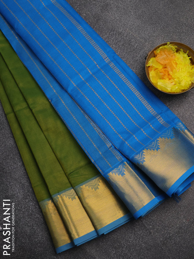 Silk cotton saree light green and cs blue with plain body and temple design zari woven border