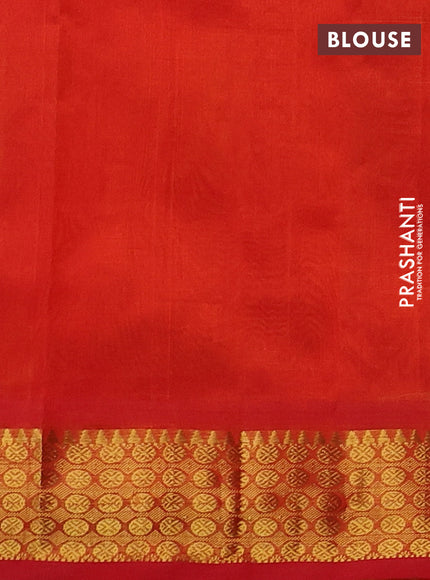 Silk cotton saree light green and orange with allover paalum pazhamum checks & zari buttas and zari woven border