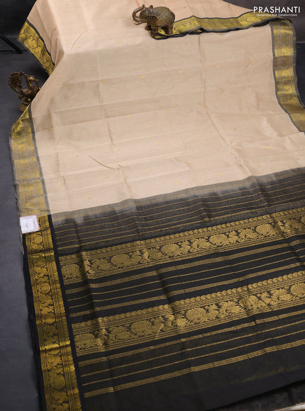 Silk cotton saree beige and black with allover vairosi pattern & buttas and zari woven border