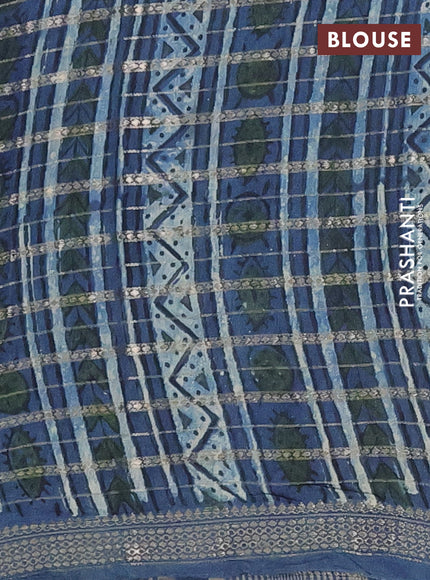 Semi chanderi saree indigo blue with kalamkari prints and long printed zari woven border