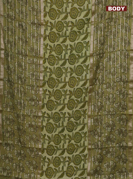 Semi chanderi saree pista green and green shade with allover ajrakh prints and long printed zari border