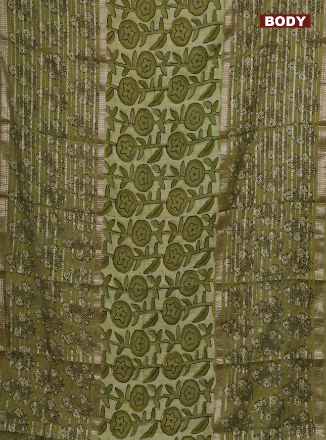 Semi chanderi saree pista green and green shade with allover ajrakh prints and long printed zari border