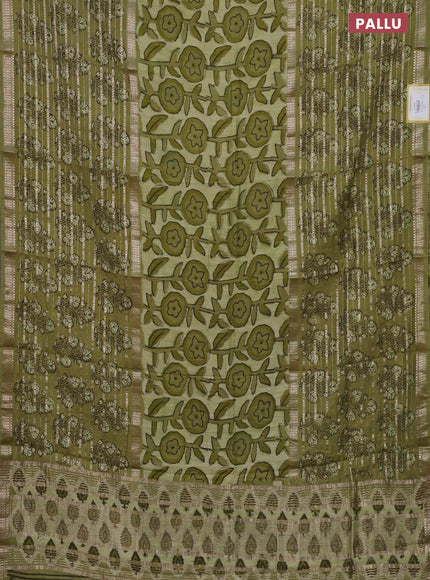 Semi chanderi saree pista green and green shade with allover ajrakh prints and long printed zari border