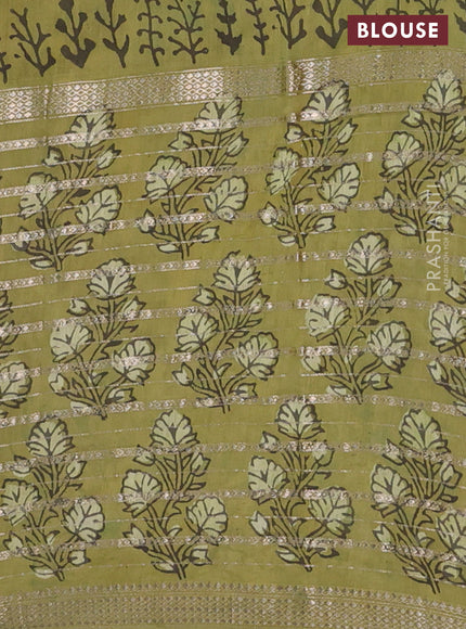 Semi chanderi saree pista green and green shade with allover ajrakh prints and long printed zari border