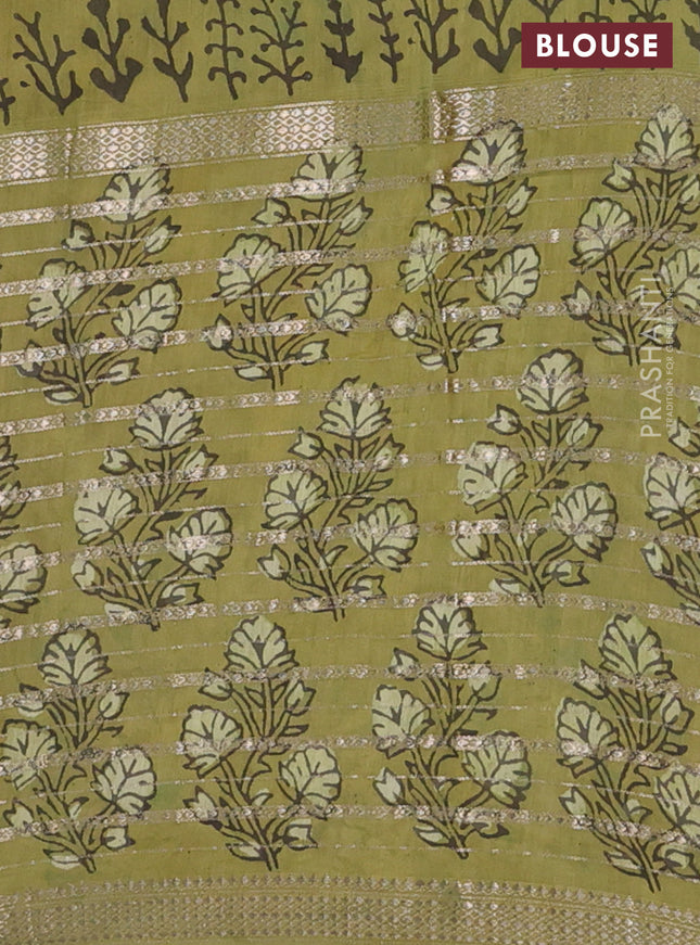 Semi chanderi saree pista green and green shade with allover ajrakh prints and long printed zari border