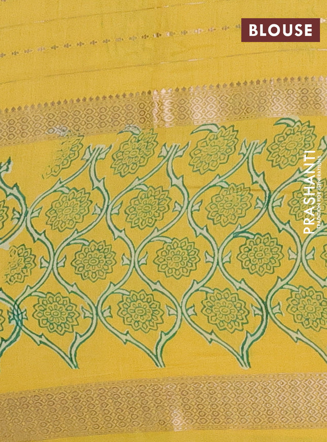 Semi chanderi saree yellow with allover zari weaves and long printed zari border