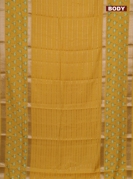 Semi chanderi saree yellow with allover zari weaves and long printed zari border