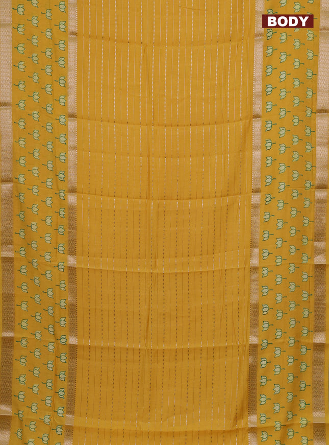 Semi chanderi saree yellow with allover zari weaves and long printed zari border