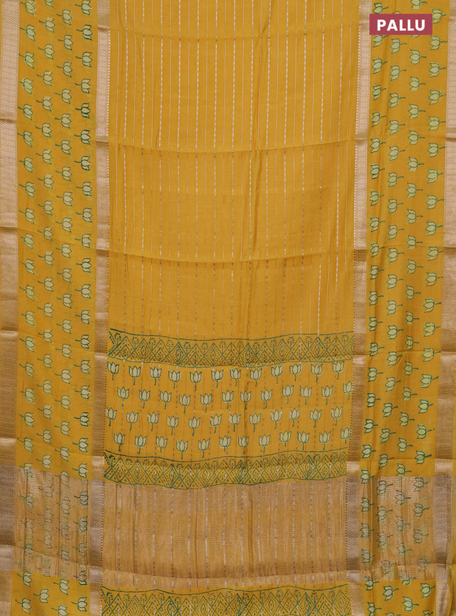 Semi chanderi saree yellow with allover zari weaves and long printed zari border