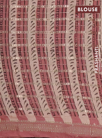 Semi chanderi saree pastel peach shade with allover ajrakh prints and long printed zari border