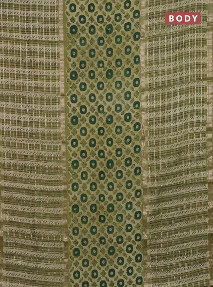 Semi chanderi saree lime green and green with allover ajrakh prints and long printed zari border