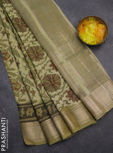 Semi chanderi saree pista green and sap green with allover kalamkari prints and zari woven border