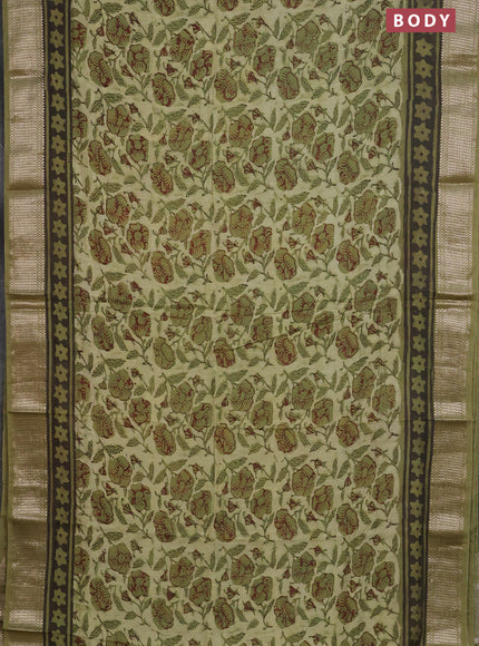 Semi chanderi saree pista green and sap green with allover kalamkari prints and zari woven border