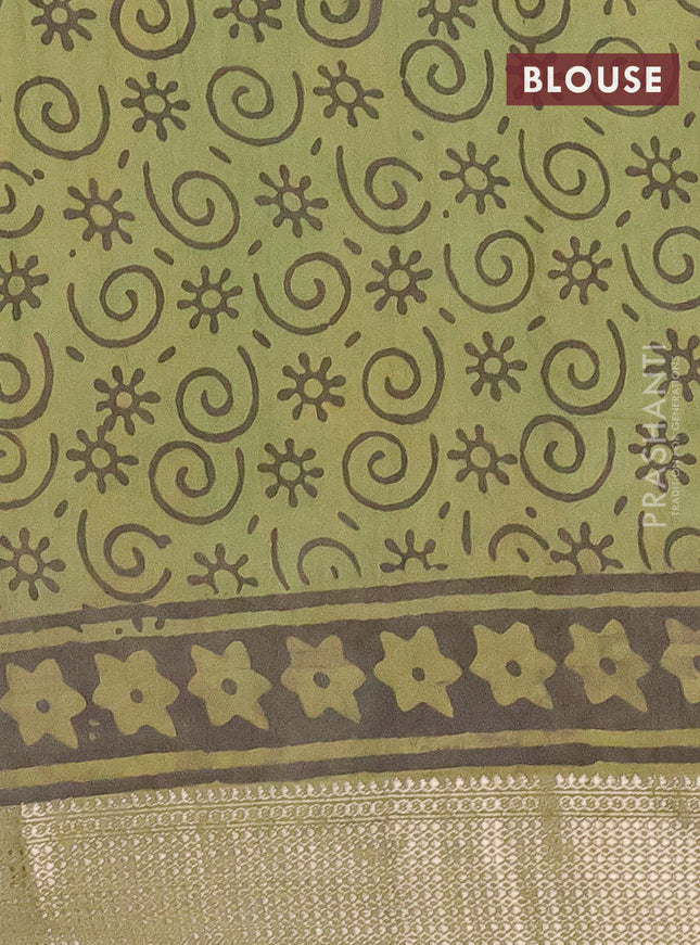 Semi chanderi saree pista green and sap green with allover kalamkari prints and zari woven border