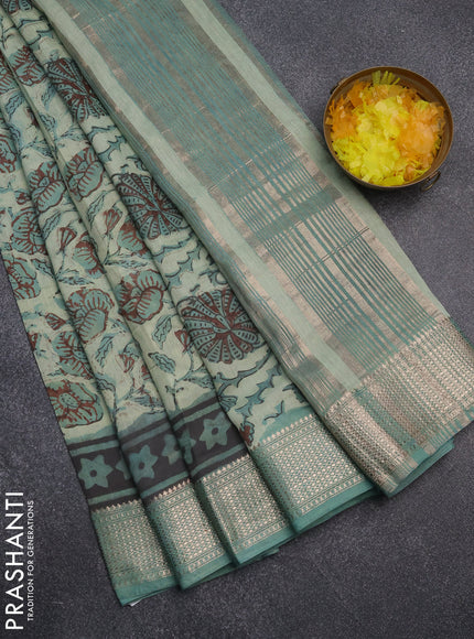 Semi chanderi saree pastel green and teal green shade with allover kalamkari prints and zari woven border