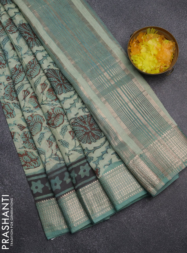 Semi chanderi saree pastel green and teal green shade with allover kalamkari prints and zari woven border